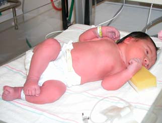 Kyla and her first diaper