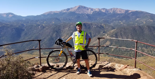 Matt Carpenter and his Salsa Cutthroat with Pikes Peak in the background